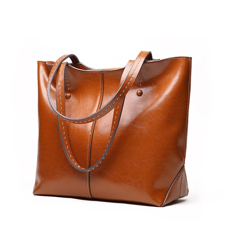 Hbd3830ebe0c94967a0cc9fc3777e27a5F.jpg Women's Luxury Genuine Cow Leather Handbag – Versatile Large-Capacity Fashion Bag - Image 1